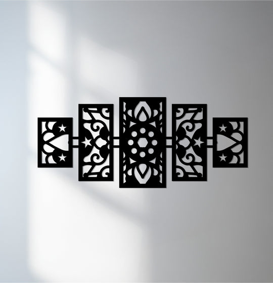 Brightest area highlights the laser-cut details of the celestial geometry five-panel Islamic pattern decoration wall art in black metal.