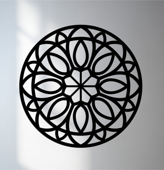 Black, powder-coated finish emphasizes the delicate lines of this Inner Bloom mandala metal artwork, creating a striking focal point for home decor.