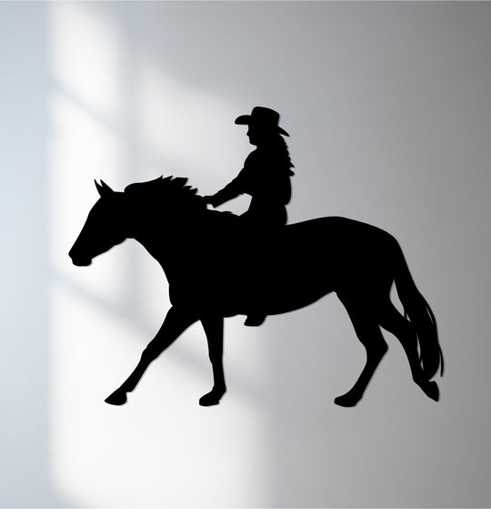 Emphasizing the layering effect, this unique metal wall art shows a striking silhouette of a cowboy on horseback, bringing a Western touch to home decor.