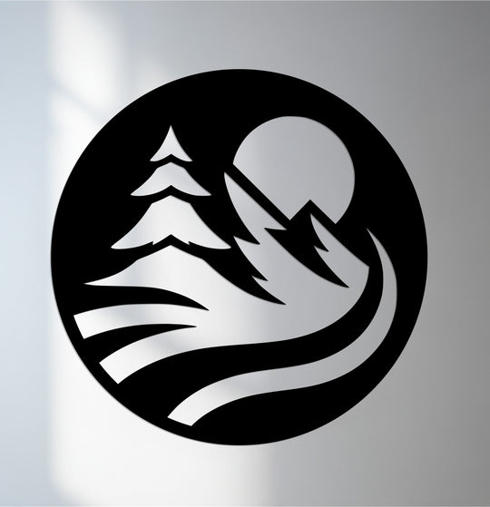 Subtle gradations of light and shadow define the minimalist mountain landscape in this striking circular metal artwork, creating depth within the metal artwork design.