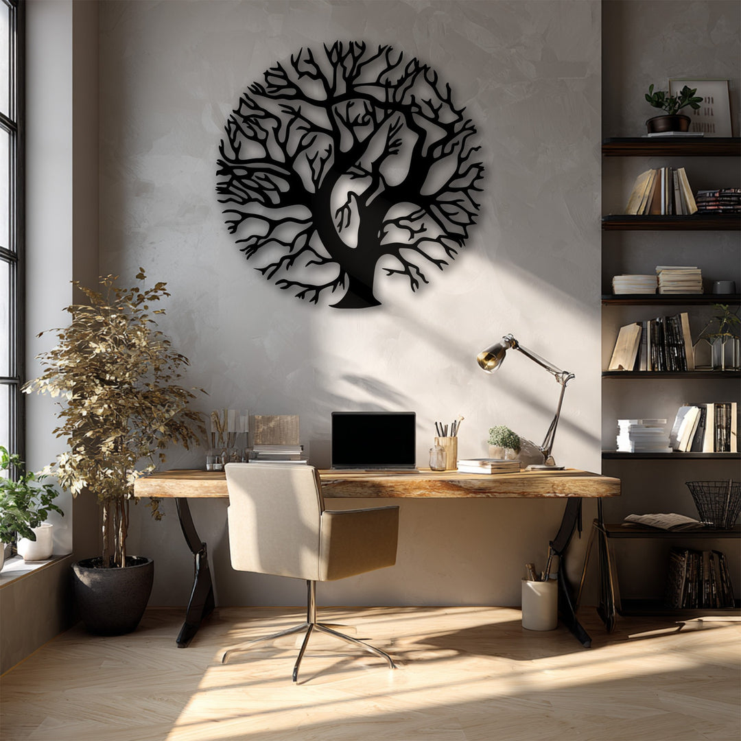 Sunlight streams across the textured wall and desk, vividly highlighting a bold Tree of Life unique metal wall art silhouette.