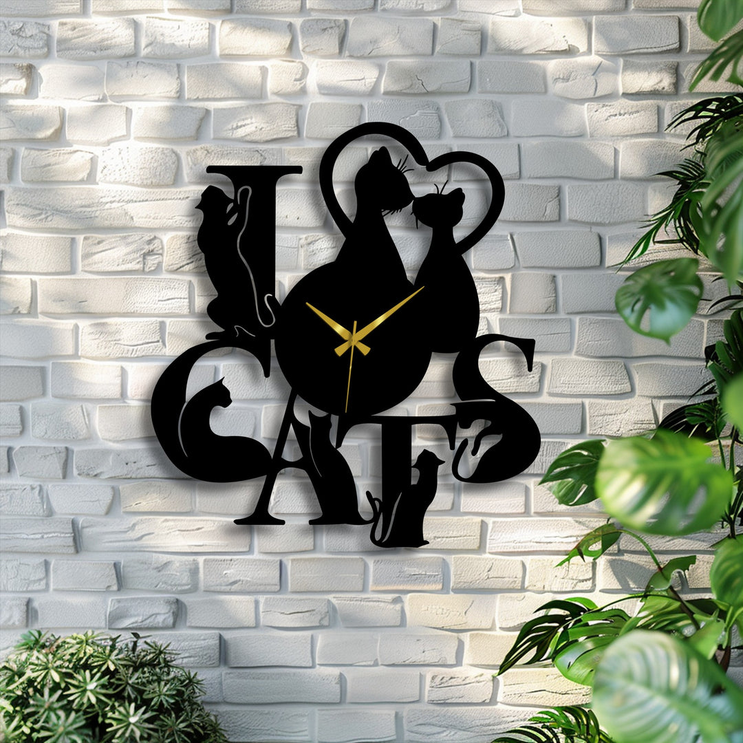 Jet black metal art for wall, a romantic Love Cats metal wall clock with feline silhouettes, stands out against a stark white brick wall.