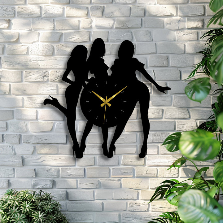 Defined by its crisp borders, the stylish metal wall clock features a laser-cut female silhouette adding unique decoration wall art to any space.