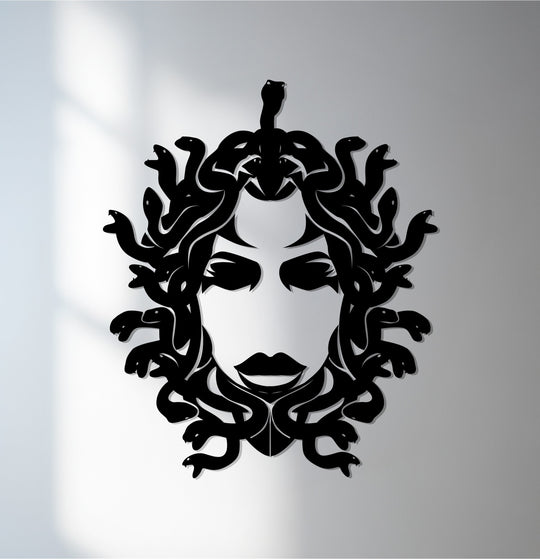 Illuminated by the brightest area, this decorative metal art depicts a Medusa silhouette, a mythological Greek goddess.