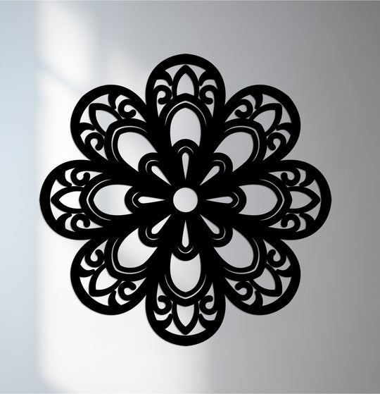 Cool color temperature enhances the stark contrast of this black ornate bloom mandala design for modern metal wall decor.