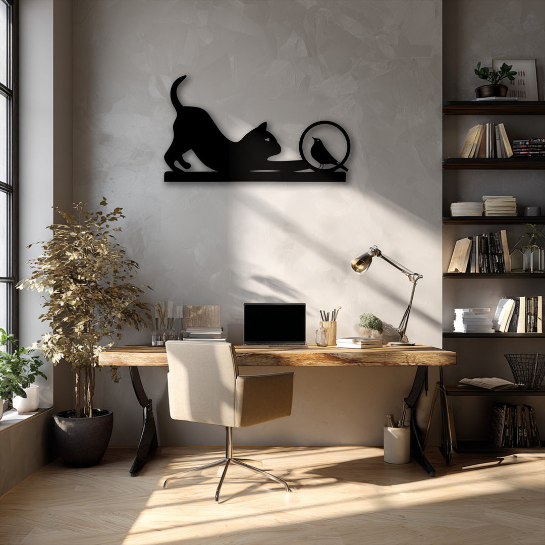 The realistic detail of the minimalist metal decoration wall art shows a playful cat silhouette reaching for a curious bird.