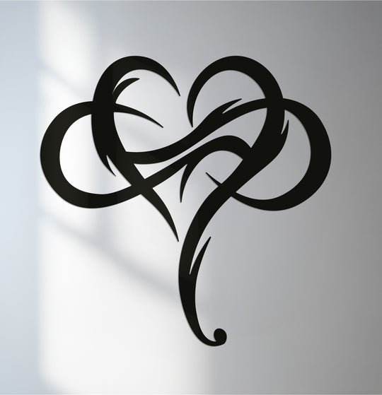 With layered depth enhanced by shadows, this tribal heart abstract love symbol metal art for wall offers a striking, multi-dimensional focal point.