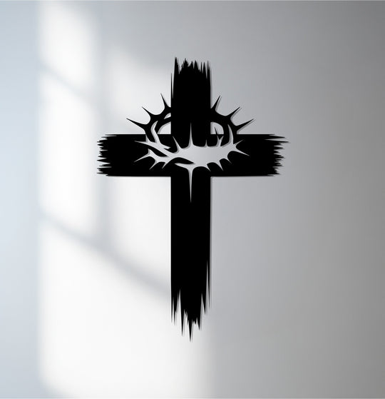 The crown of thorns cross stands boldly as decorative metal art, capturing Christian faith with its powerful design.