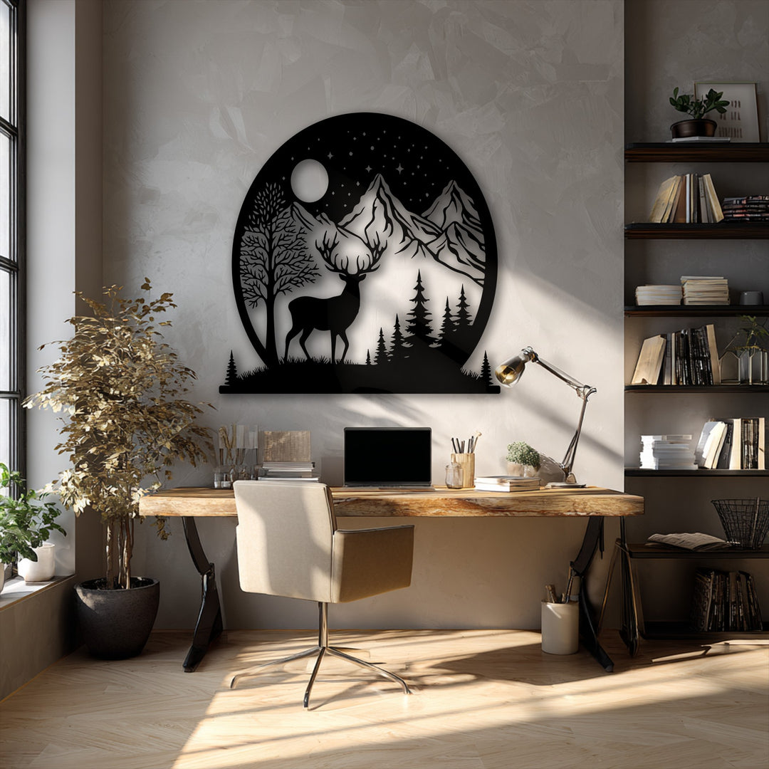 Sunlight brightens the wood floor, reflecting near a stunning Moonlit Wilderness deer and mountain metal artwork in a contemporary workspace.