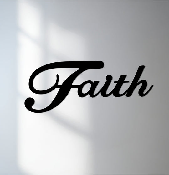 Cool color temperature emphasizes the black decorative metal art spelling 'Faith', creating a striking contrast against the softly lit backdrop.