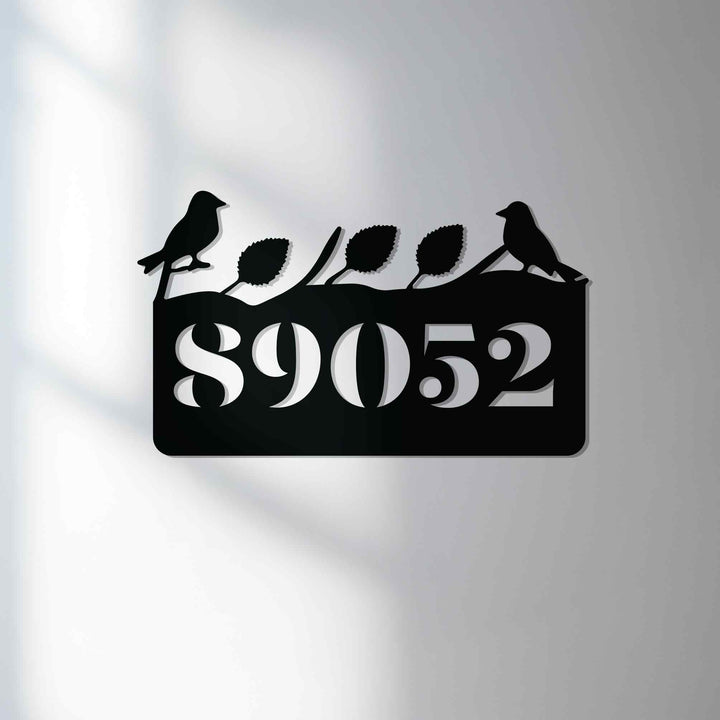 Decorative metal address plaque with birds and leaves