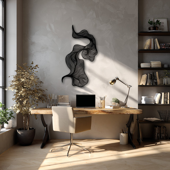Showcasing an abstract quality, this black metal artwork features intricate flowing lines, creating a striking modern focal point.