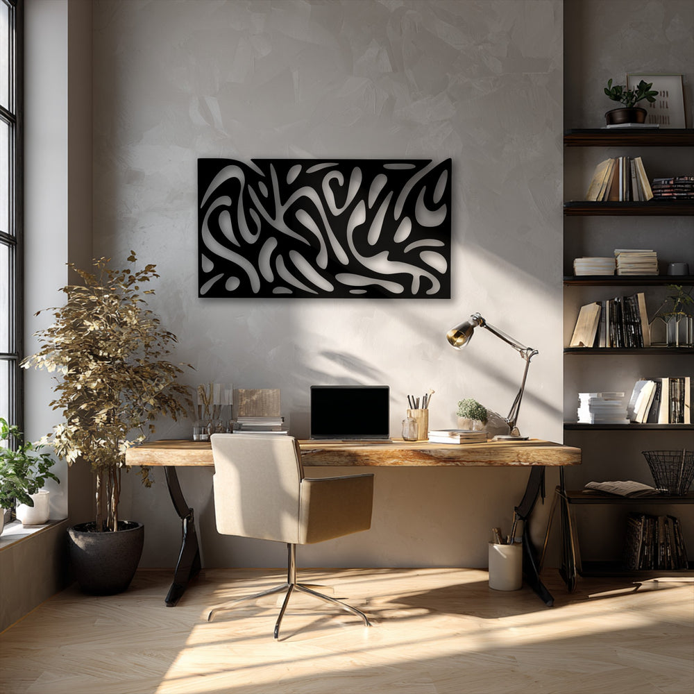 The dominant black and white palette of this unique metal wall art creates an abstract fluid pattern.