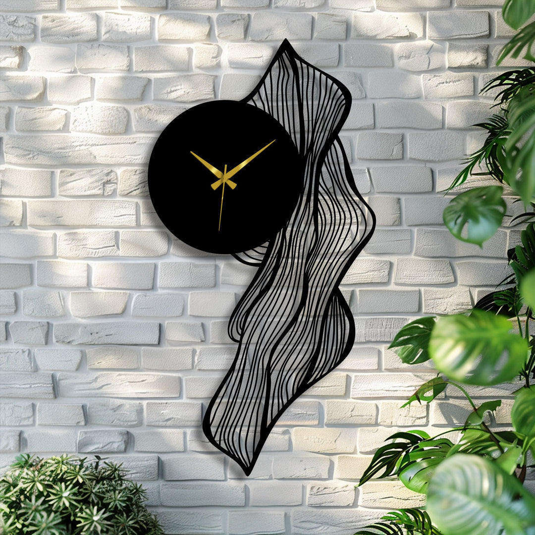 Illustrating the layering effect, this decorative metal art clock features a flowing, abstract leaf design, creating a visually captivating botanical wall accent.
