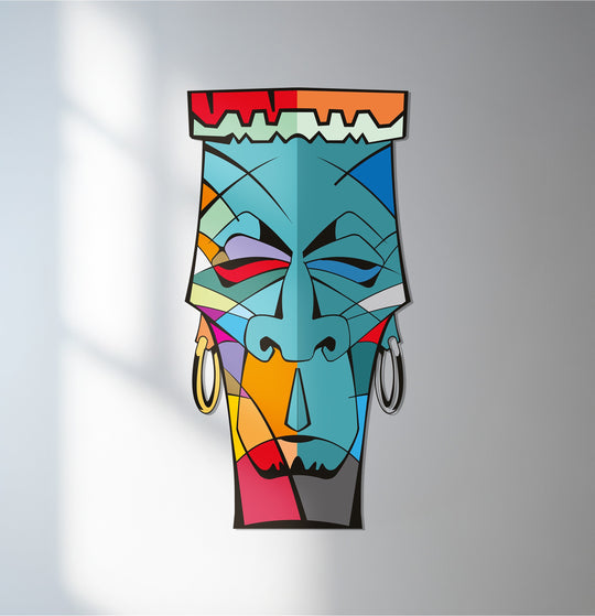 Cool color temperature contrasts boldly in this abstract tribal face metal wall decor, creating a striking and modern piece of metal wall art.
