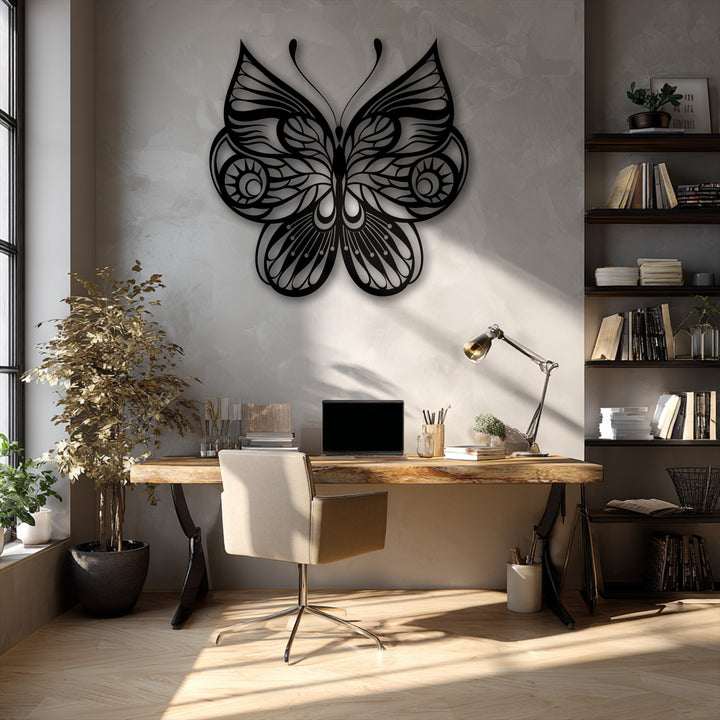 The stillness of the room is enhanced by the ornate butterfly metal wall decor above a light wood desk, casting gentle shadows.