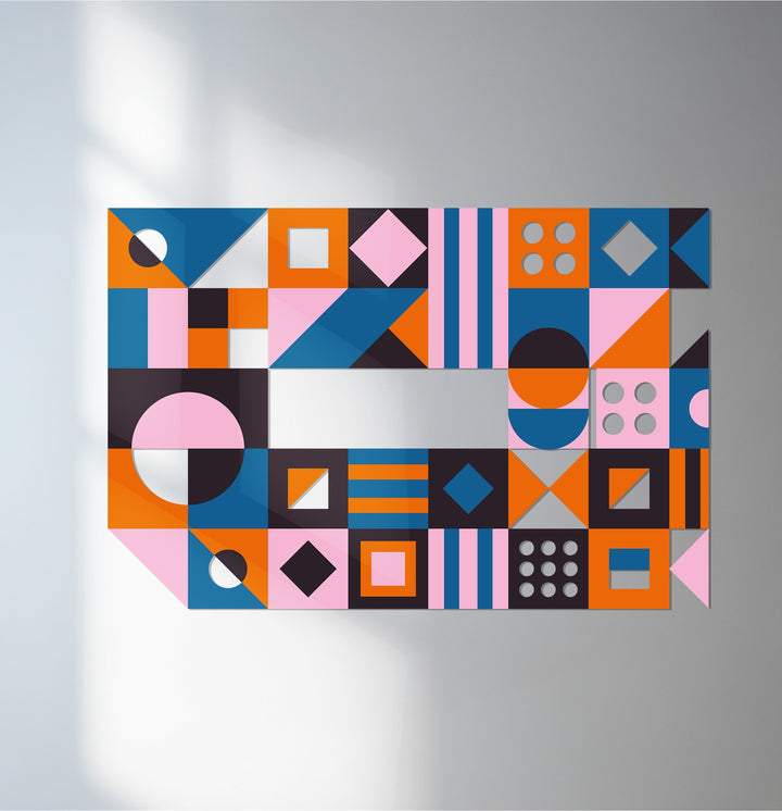 Modern multicolor metal wall decor featuring squares and circles
