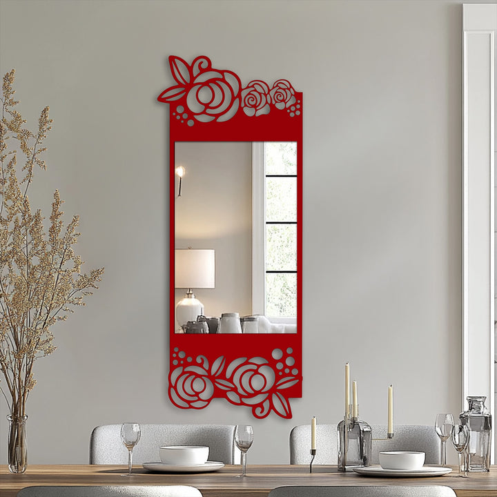 The focal point is the floral elegance mirror for wall decor, displaying a rose motif in an ornate black metal frame reflecting a lamp.