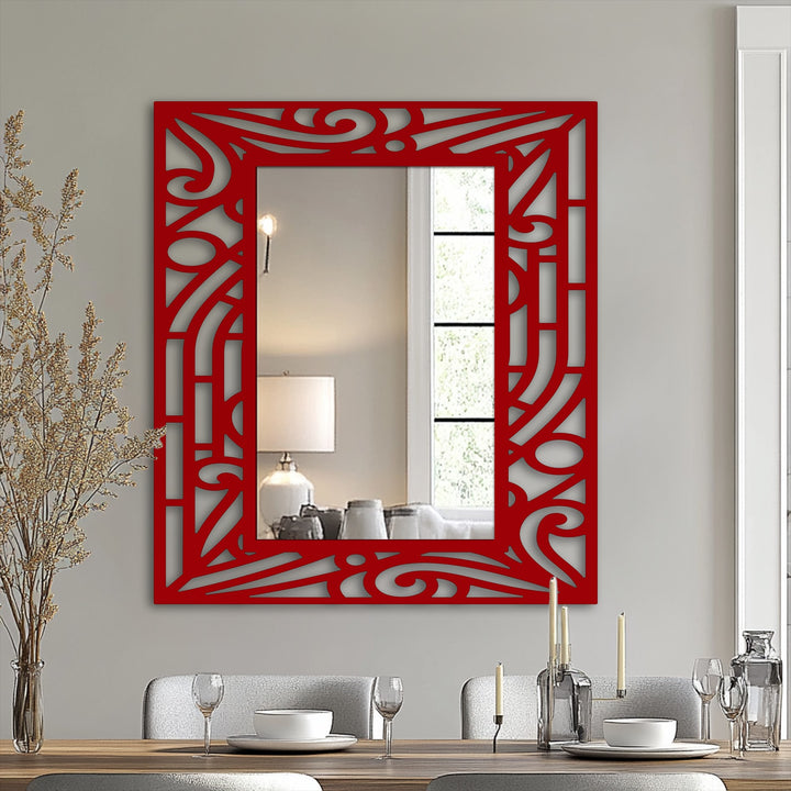 Organic forms compose the abstract curved line pattern in this decorative metal art, creating a unique frame for the modern floor mirror.