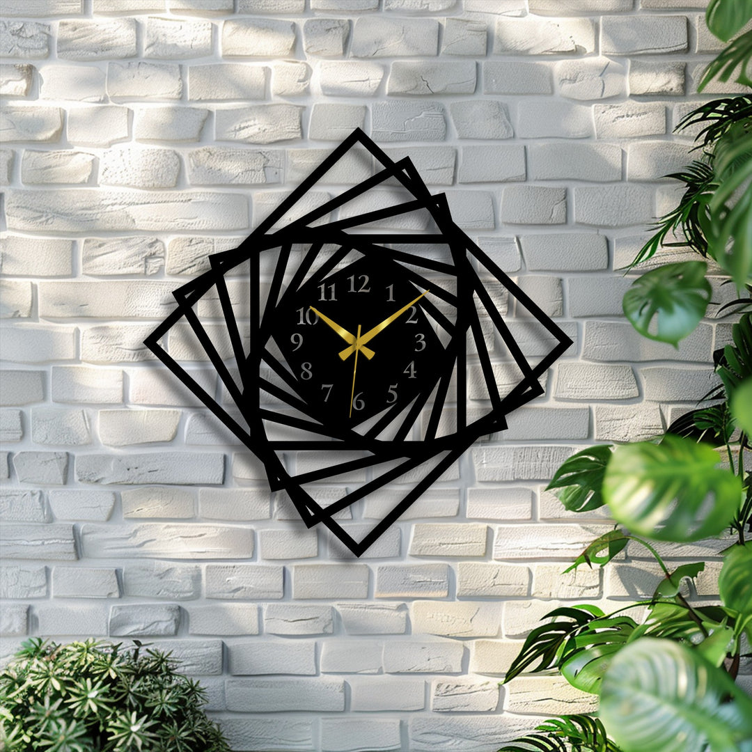 Coolly lit, this decorative metal art, a geometric spiral metal wall clock with golden hands, stands on a bright white brick wall.