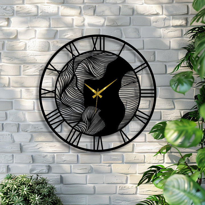 Circular, horizontally oriented metal artwork clock showcases an abstract wave design with roman numerals, enhancing its modern artistic decor.