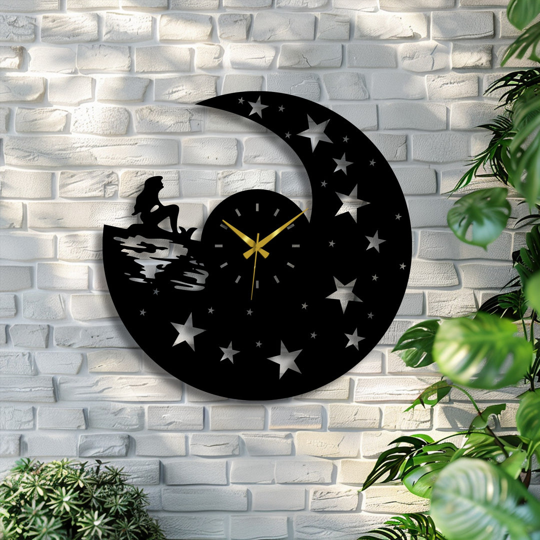 Black is the dominant color of this Moonlight Dream metal wall clock, enhancing the decorative metal art with a celestial moon and stars design.