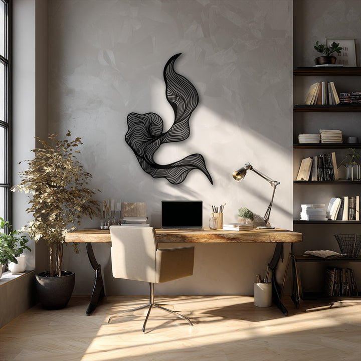The background displays a subtly textured, light gray wall that perfectly complements the intricate decorative metal art.