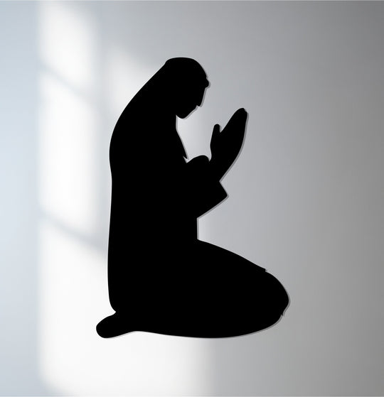 Vertical rectangle featuring a prayer silhouette that portrays Islamic devotion using metal art for wall.