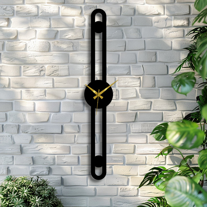 Showcasing the abstract quality of the minimalist vertical metal wall clock, a slender line design that exemplifies the beauty of metal art for wall decor with its slim silhouette.