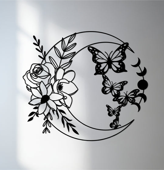 Visual rhythm flows from the floral embellishments along the crescent moon to a series of butterflies and lunar phases in this intricate metal wall decor.