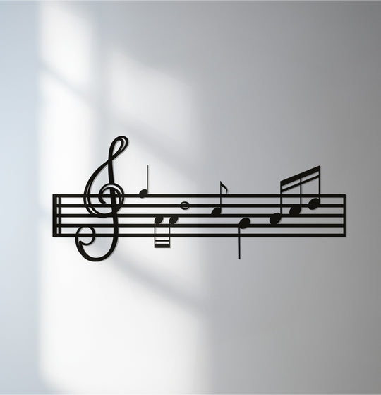 Illuminating the matte grey wall, subtle sunlight highlights the sleek design of this musical staff notes decorative metal art, infusing a soft aesthetic.