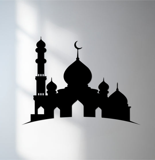 Illuminating the mosque silhouette, the brightest area highlights the intricate cutouts and crescent moon atop this striking metal wall decor, accentuating its modern Islamic design.