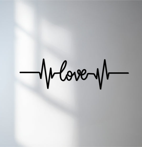 Negative space accentuates the sleek design of the heartbeat love script, showcasing a modern piece of metal wall decor that adds an elegant touch.