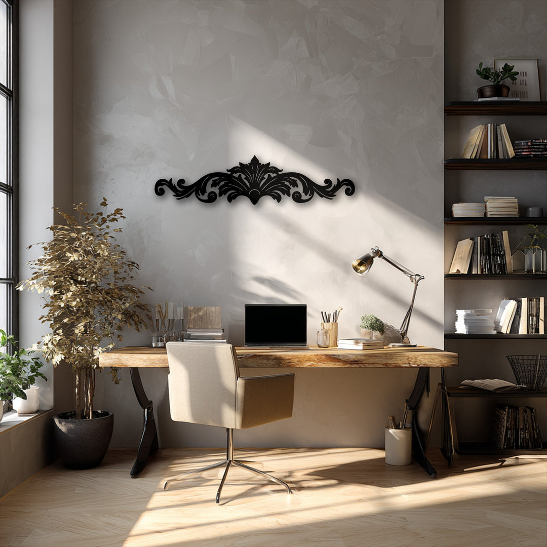 The brightest area reveals the intricate Regal Flourish – Ornamental Scroll Metal Wall Art, a sophisticated metal artwork on a textured wall.