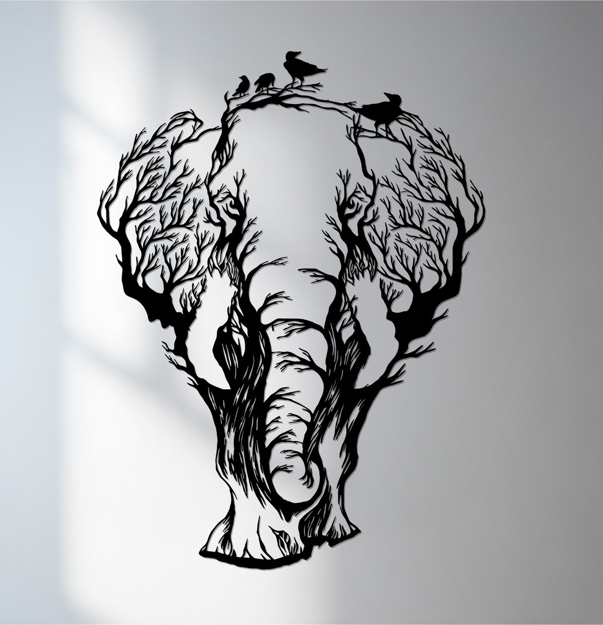 Shadows accentuate the contours of this captivating elephant tree metal artwork, showcasing a unique wildlife-inspired design.