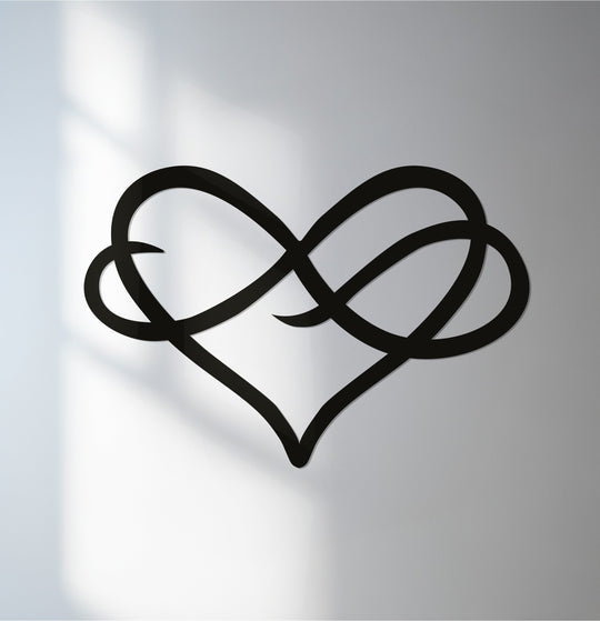 Depth and layers highlight the flowing metal art for wall with this infinity heart, creating a captivating, modern love symbol with subtle shadows.