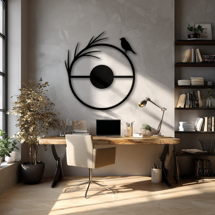 Light greige wall with a striking unique metal wall art featuring a minimalist black bird circle design.