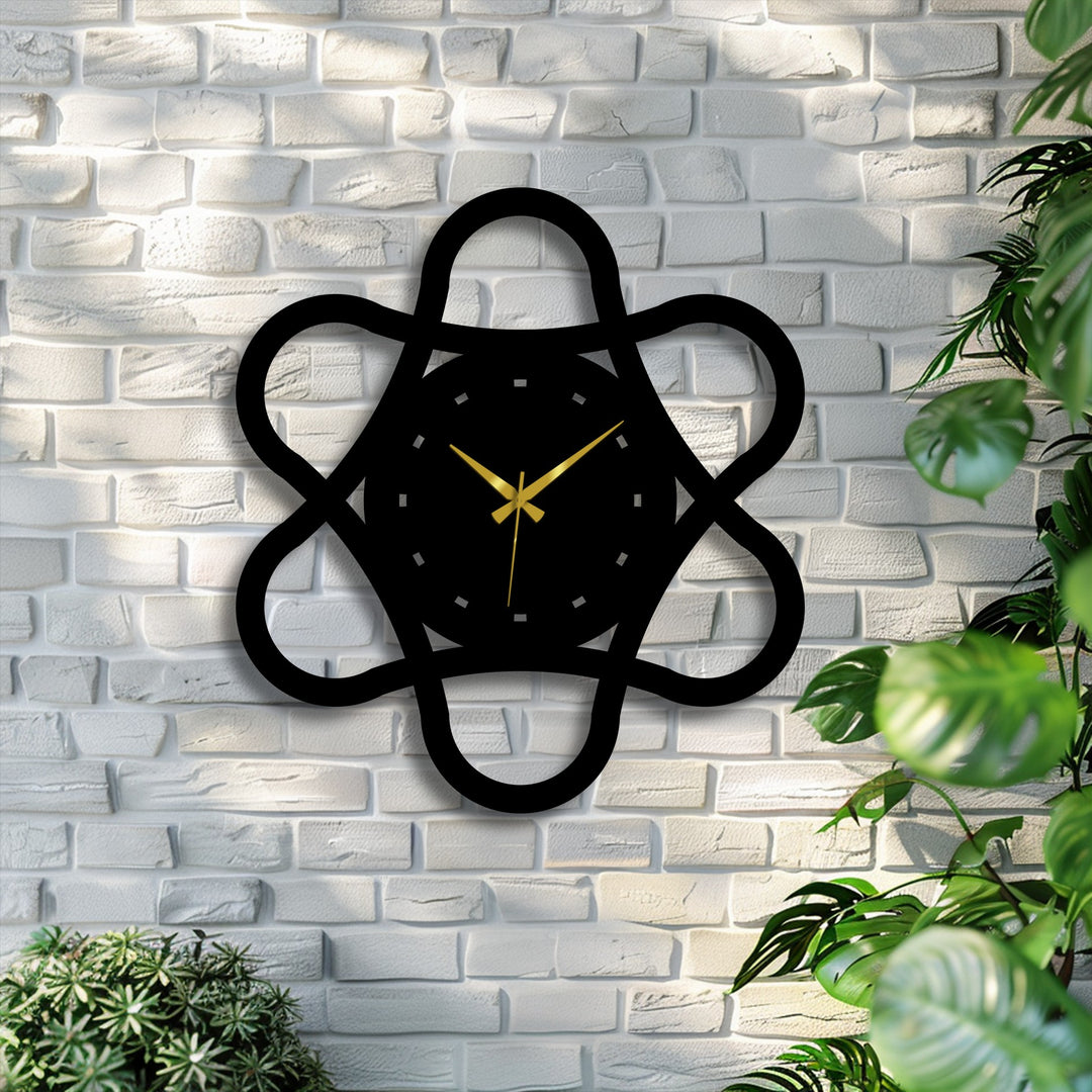 The focal point is the modern abstract metal wall clock's intricate loop geometry, making it a striking decoration wall art piece against the textured brick.