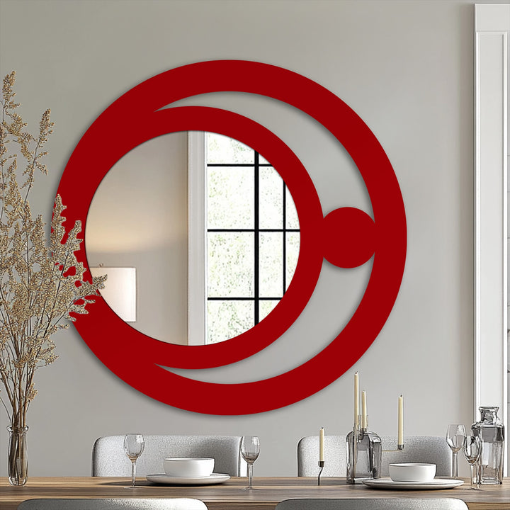 The stillness of the mirrored reflection complements the unique metal wall art's minimalist celestial design, creating a serene focal point.