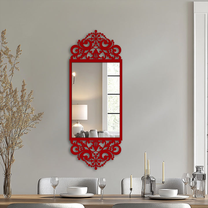 Vertically oriented, rectangular stained glass wall mirror features an ornate baroque frame with scrolling details at the top and bottom.