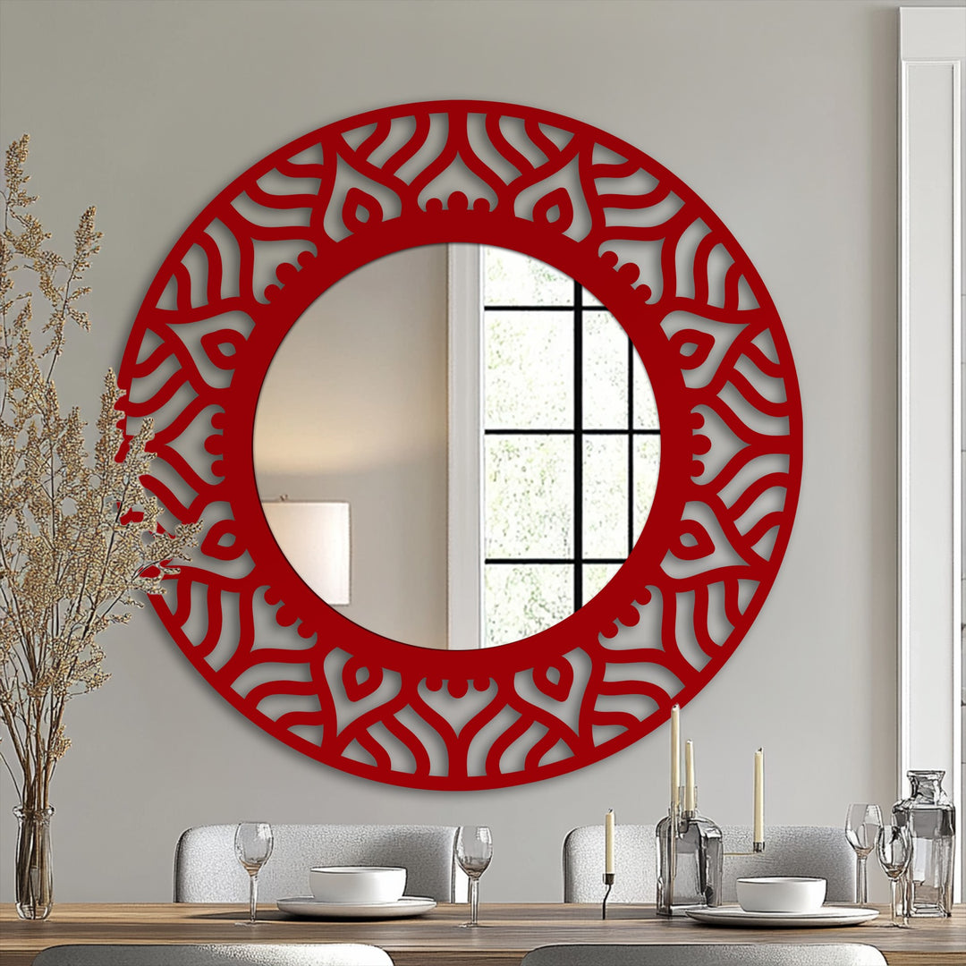 Showing the realistic detail of the stained glass wall mirror, the photograph captures the ornate, red framed round wall mirror in a dining room setting.