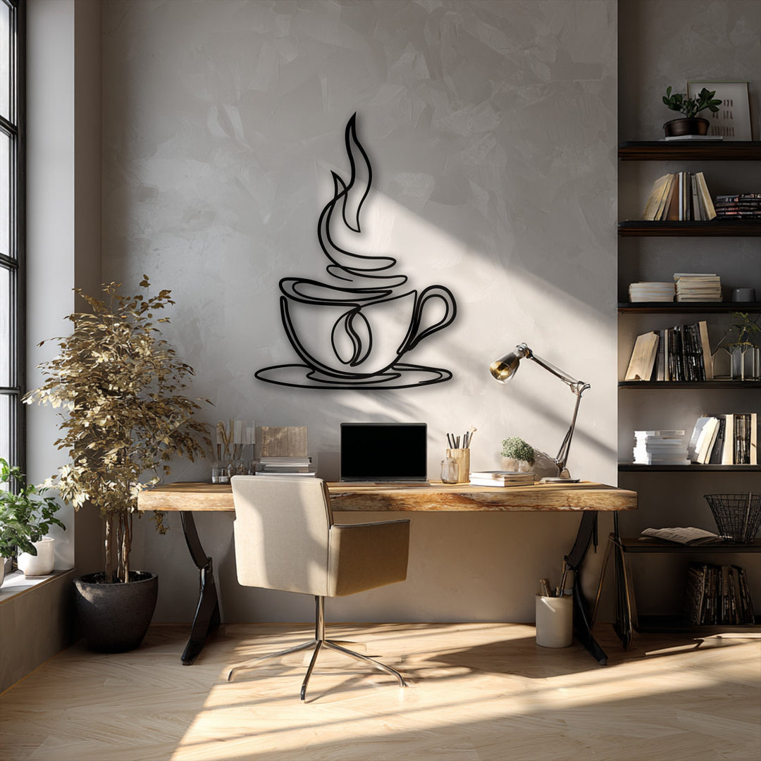 The textured, light grey wall provides a striking backdrop for the sleek, black coffee cup line metal art for wall, highlighting its smooth surface.