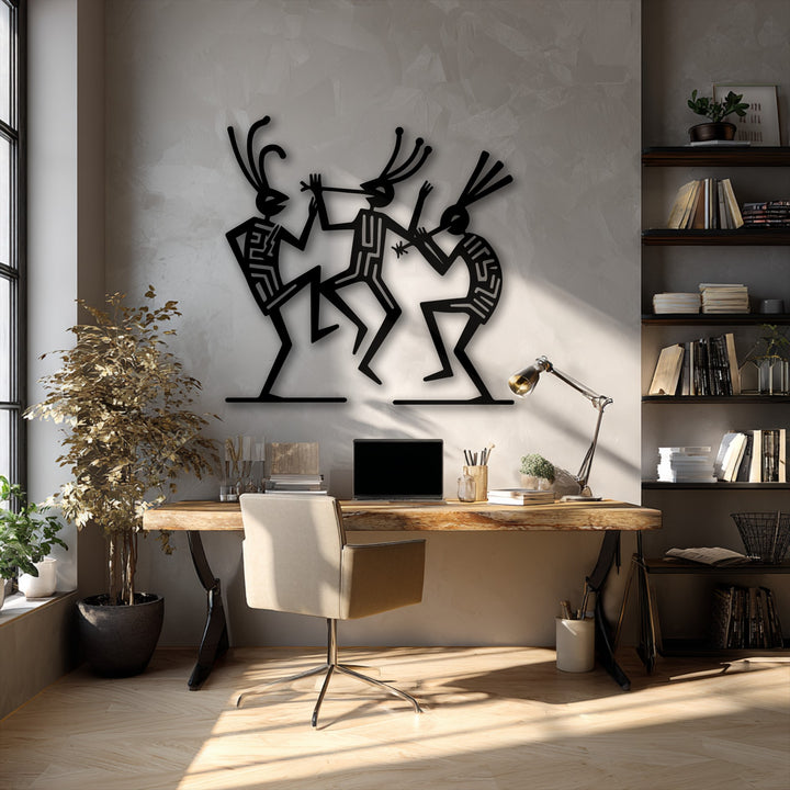 The durable black metal art for wall vibrantly depicts tribal dance figures, showcasing exceptional material quality and intricate design.