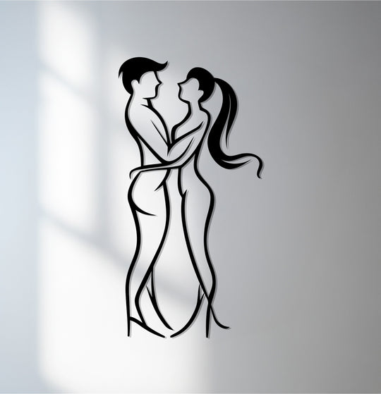 Finished in sleek black, this minimalist Romantic Embrace metal art for wall showcases a loving couple silhouette.