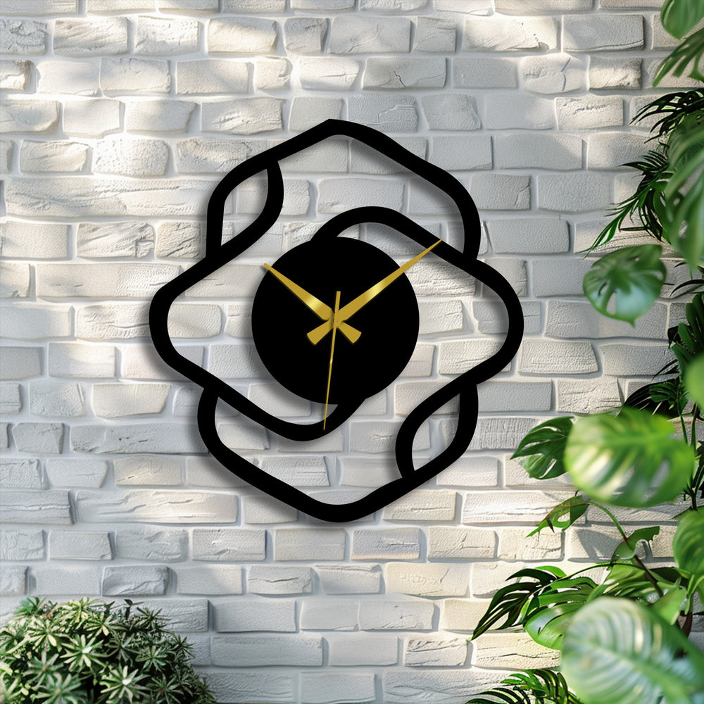The stillness of time captured by this abstract organic shape modern metal art for wall clock, suspended against the textured brick with golden hands.