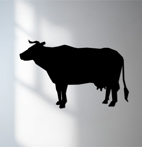 Showcasing the layering effect, this metal artwork of a cow silhouette presents a farmhouse-style design perfect as unique wall décor.