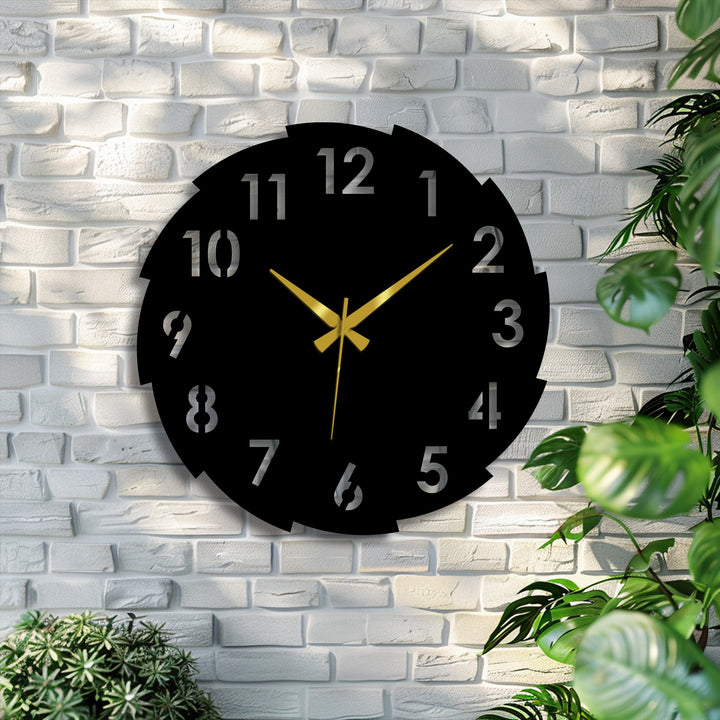 Highlighting the geometric elements, this segmented modern number design metal wall clock offers a contemporary home decor statement with its circular form and radial number arrangement.