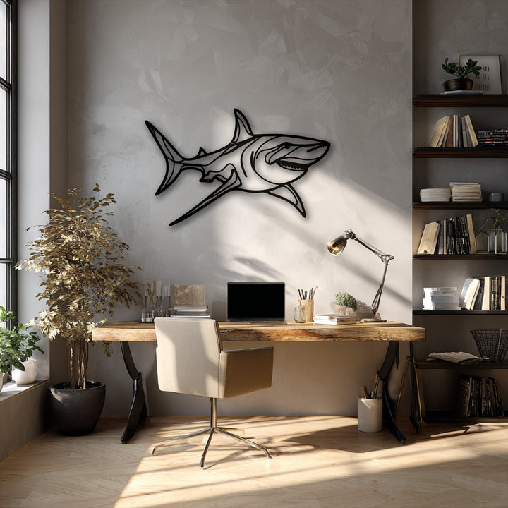 Negative space sharply defines the bold contours of the unique metal wall art, forming a dynamic shark silhouette against the subtly textured wall.