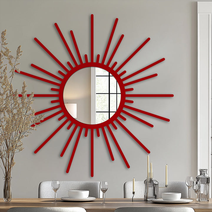The realistic detail of the vibrant red sunburst mirror, a striking piece of metal art for wall, clearly shows window reflections.