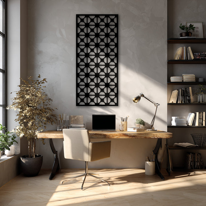 The visual rhythm of the repeating geometric circle pattern creates a striking piece of decorative metal art for a modern wall.